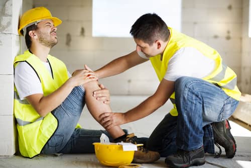 Man injures his leg on a construction site