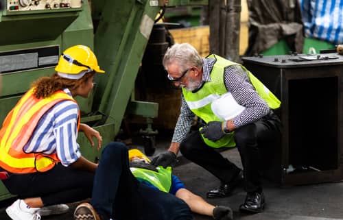 Man was injured while at work, and coworkers are explaing workers' compensation benefits in Decatur, GA