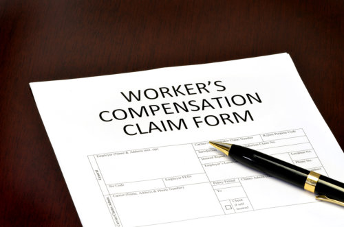 Concept of workers' compensation claims process process in Woodstock, Georgia